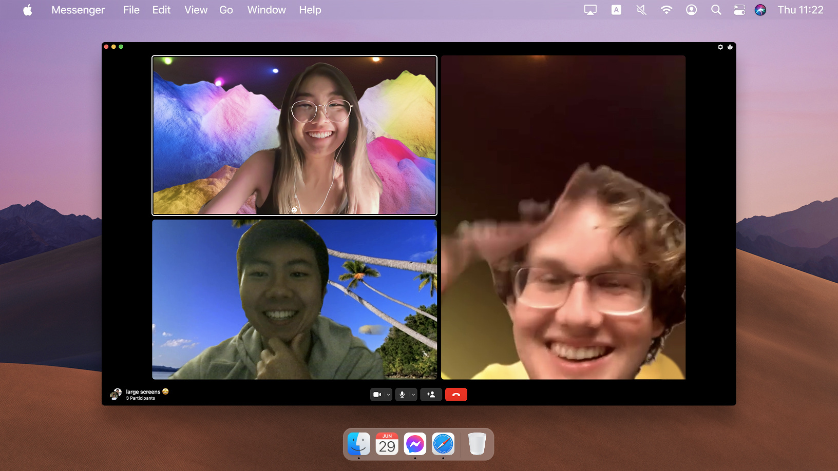 A Messenger Desktop video call with AR filters applied to three participants.
